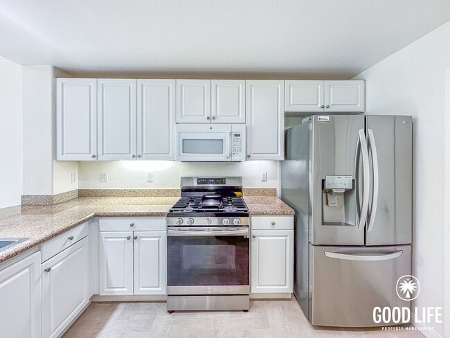 Photo - OC: Spacious 2BD/2.5BA Condo in Irvine with Resort-Style Amenities, Private Balcony & In-Unit Lau...