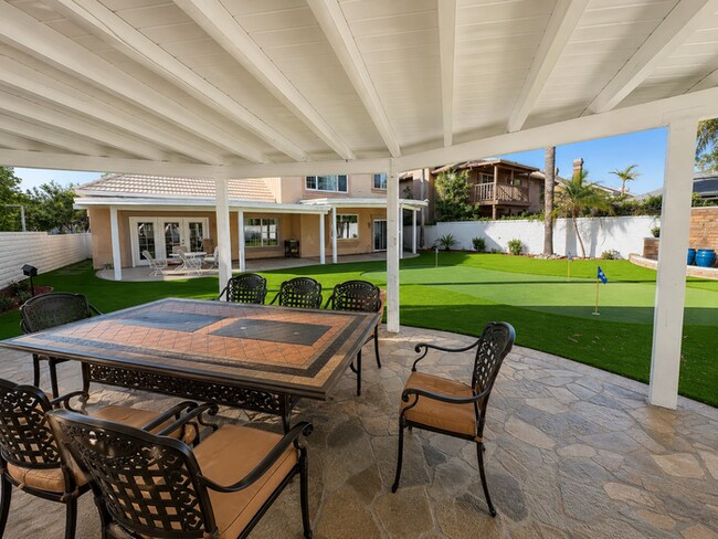 Photo - Furnished 4BR + Office | Putting Green Yard