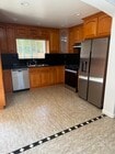 Kitchen with new appliances - 2003 S Curson Ave Apartments Unit Mid City 2003 S Curson