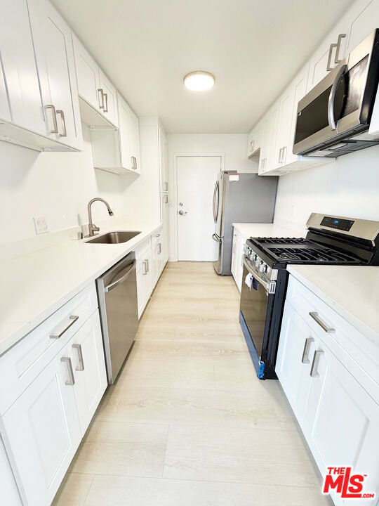 Building Photo - 468 S Roxbury Dr Unit 404