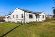 Front and side of the house. Corner unit home with beautiful space that includes dedicated parking. - 1823 N Ditman Ave House