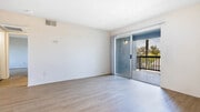 Living Room with Balcony and Hard Surface Flooring - Hathaway
