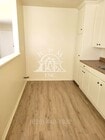 Photo - Spacious Upstairs 2-Bedroom, 1-Bathroom Ap... House