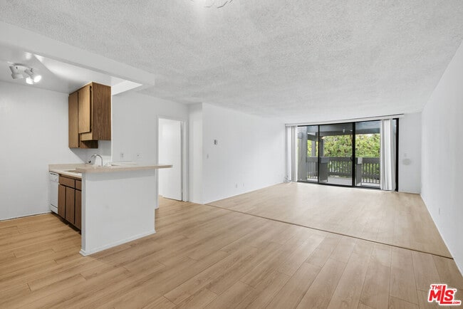 Building Photo - 7742 Redlands St Unit H3028
