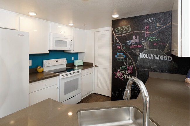 Standard Apartment Kitchen with Quartz Countertops - AVA Studio City