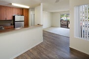 Kitchen, living, and dining area - eaves San Marcos Apartments