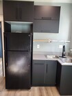 Brand new GE refrigerator w/ice maker; double sink with garbage disposal - 579 W. 13th St Townhome