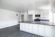 2BR, 2BA - 1,000SF - Kitchen & Dining Area - 4021 Stevely Ave Apartments