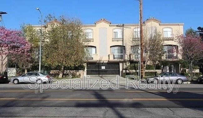 Building Photo - 5716 Whitsett Ave Unit 13