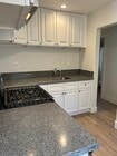 Brand new kitchen with granite, new cabinets and fliors - 912 1/2 California Ave