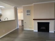 Living room Gas fireplace - Bay Timbers Apartments