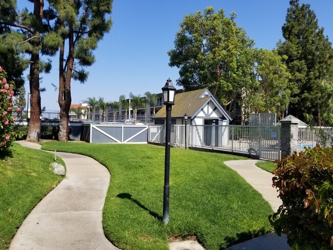 Main grassy area & Pool bathrooms - 3028 W Cheryllyn Ln Unit 3028