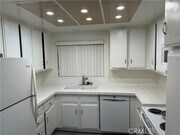 Photo - 2399 Via Mariposa W Condo Unit 1C