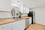 Galley kitchen - 4510 48th St Apartments Unit 1BR