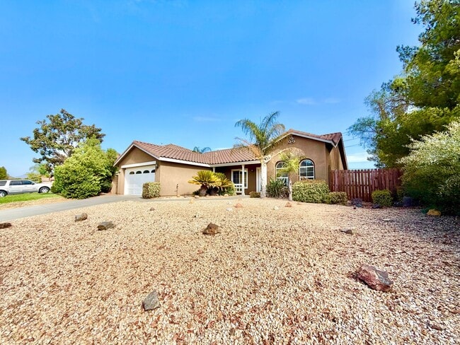 Building Photo - Charming 3 Bedroom Home with Open Layout & Hill Views!
