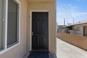 Front door to unit D - 2516 Voorhees Ave Unit D