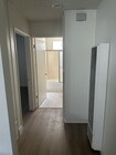 Hallway into bedroom and kitchen - 200 S Carondelet St Unit Apt 2