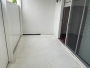 Patio Area by Pool - 933 W Huntington Dr Apartments