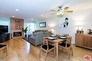 Fireplace in living room/dining room area - 1951 N Beachwood Dr Condo Unit 203