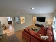 Living room with kitchen in background - 424 Ocean Park Blvd Apartments Unit 1