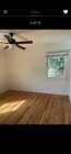 Both bedrooms feature wood floors and ceiling fans. - 4411 Ensign Ave Apartments