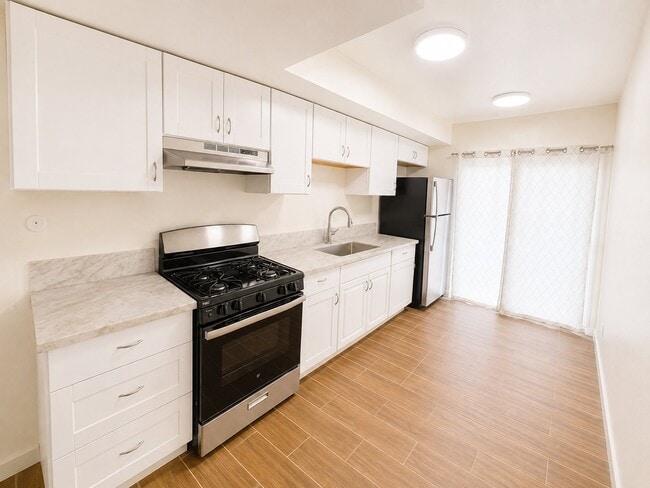 Photo - 14026 Paramount Blvd Unit 11