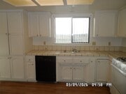 Photo - 3 Bedrooms, 1.75 Bathrooms, 2 Car Garage, Fully Fenced, Central Air & Heat, Large Lot, Wood Flooring