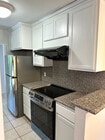 05 - Kitchen - Range + Refrigerator - 1831 Barry Ave Unit 7