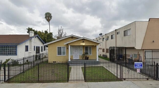 Building Photo - 6412 10th Ave