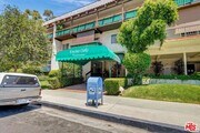 front of building - 5460 White Oak Ave Condo Unit C209