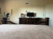 Master bedroom dresser & TV - 7010 Dennison St