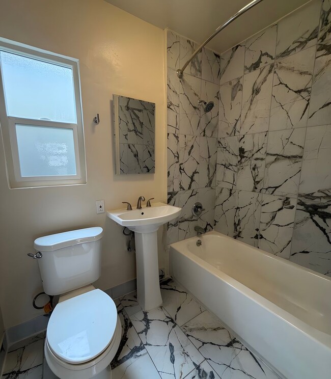 Photo - Luxuriously Renovated Bungalow Style 1 Bed / 1 Bath Apartment ~ Comes with Appliances, Parking, W... Unit 4567 1/2