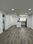 Cheerful kitchen w/ granite counters - 21400 Burbank Blvd Condo Unit 207