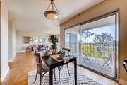 Open concept dining off the kitchen and opening up to the patio (property is unfurnished) - 916 Caminito Estrada Unit C