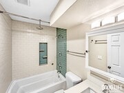 Photo - Beautiful 3B/2BA condo with Washer/Dryer & Large Backyard in Midway District! Unit 2