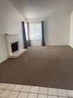 Spacious living room with fireplace - 3248 E Avenue S2 House