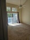 Master Bedroom with balcony access - 7532 Seaspring Dr Unit 204