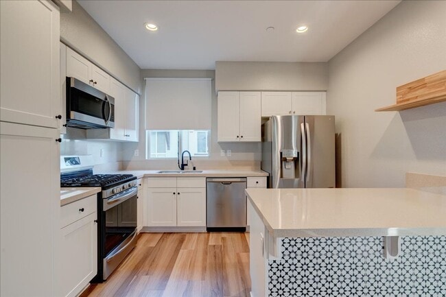 Building Photo - Modern, Energy Efficient & New 3 BD/3BA + Loft Townhome