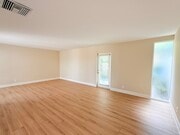 Living room with door to rear yard - 4126 Del Mar Ave