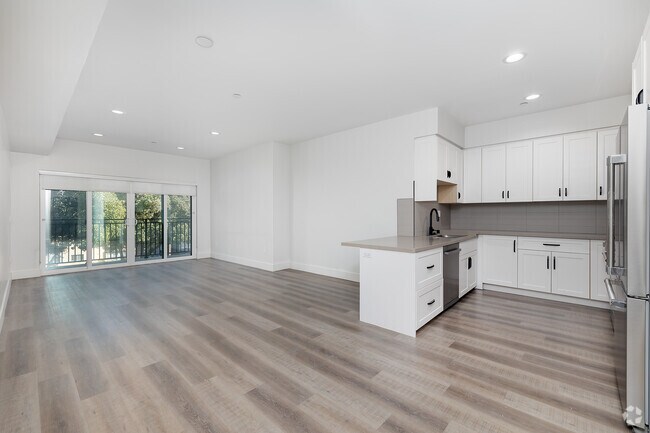 3BR, 2BA - 1,320SF - Living Room - 857 N Hayworth Ave