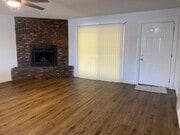 Living Room/Fireplace - 1619 N Avalon Blvd Townhome