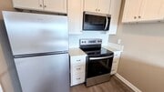 Photo - Bright 2BR Bay Park Townhome with Covered Parking & Canyon View Balcony
