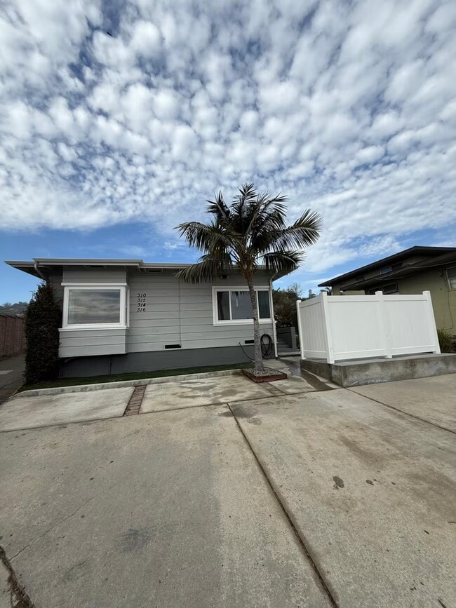 Front view of complex with off street parking. - 310 -316 Rosecrans St Apartments