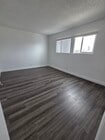 Bedroom with Luxury Vinyl Plank - 3455 Elm Ave Unit #307