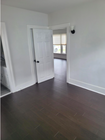 Bedroom 1 w/ Jack & Jill bathroom door - 5733 S Rimpau Blvd House