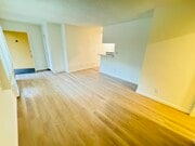UNIT #1 LIVING ROOM - 7548 Lexington Ave Apartments