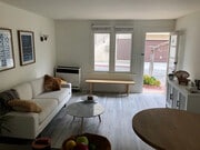 Living room has 3 large windows plus a glassdoor. - 315 4th St