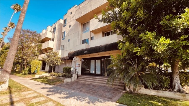 Building Photo - 19350 Sherman Way Unit 231