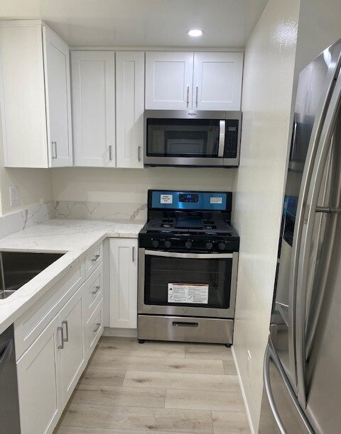 Photo - "Charming 1-Bedroom Retreat with Gleaming Hardwood Floors in Prime Irvine Location!"