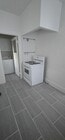Kitchen Stove and New Tile - 4310 Clarissa Ave